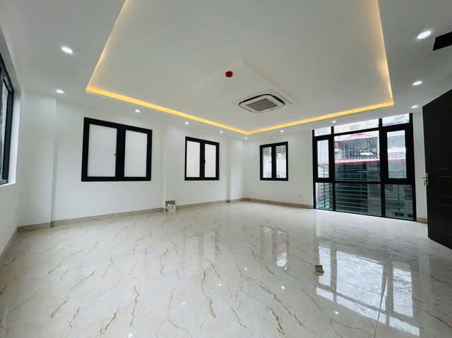 NHÀ MỚI ĐẸP Nguyễn Chí Thanh 56 m2,X 7 tầng mặt mặt tiền 8m, 23.5 tỷ Đống Đa. - Ảnh chính
