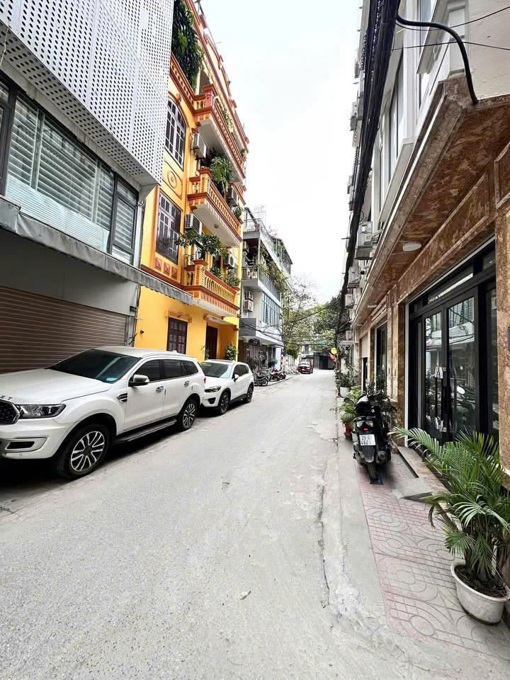 NHÀ MỚI ĐẸP 7 TẦNG THANG MÁY - PHỐ TRUNG KÍNH, CẦU GIẤY - 66M² - Ô TÔ - KD TỐT - GIÁ 24.5 TỶ - Ảnh chính
