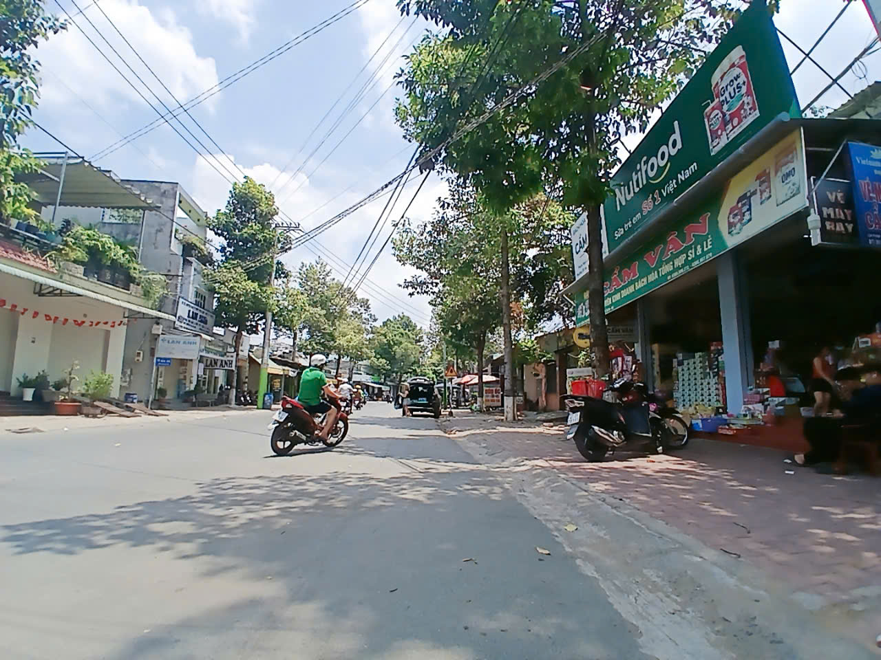 Bán nhà 2 Tầng MẶT TIỀN kinh doanh 139m2, gần chợ Dĩ An - Ảnh 1