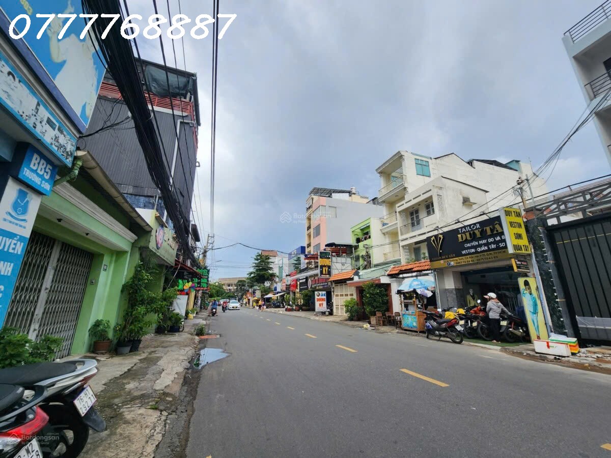 Bán tòa nhà hầm 5 tầng dt 205m2 đất, MT Trường Sơn, Quận 10 giá tốt - Ảnh 1