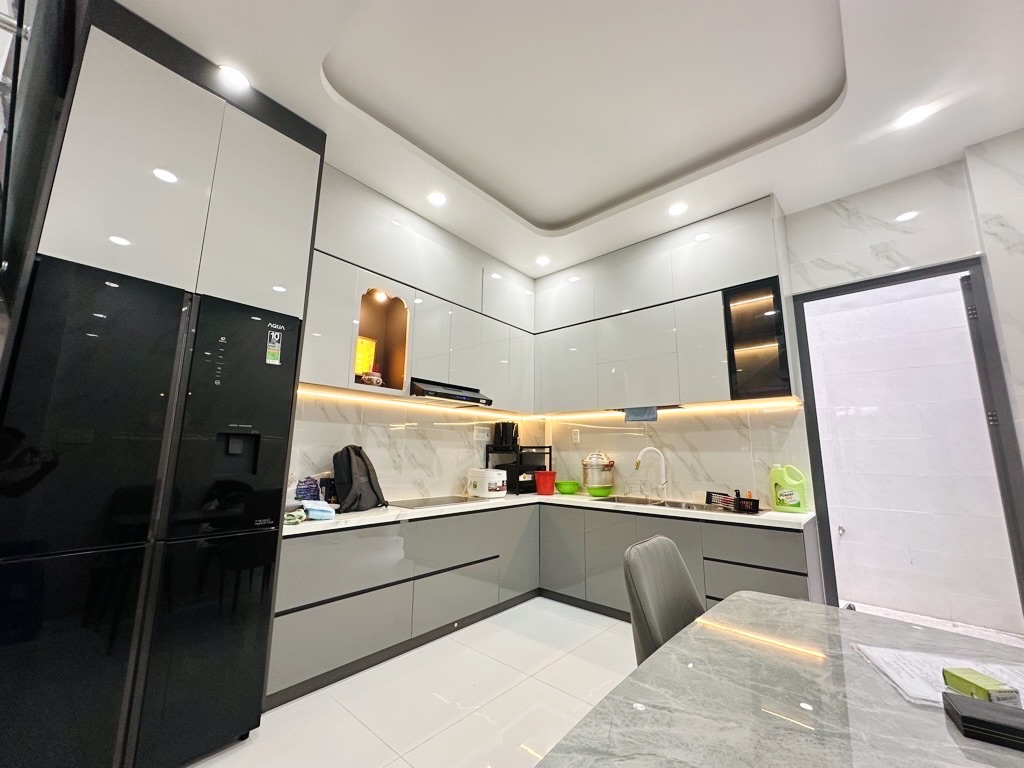 Bán nhà Q.10 4T 63m2 MT 4.3m ô tô trong nhà 12 tỷ. - Ảnh 2