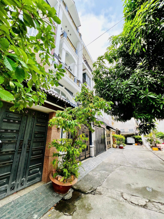 GẦN PHẠM VĂN ĐỒNG - Ô TÔ NGỦ - 57.8m2 - 4 TẦNG BCTC - 7 CHDV - 40tr/th - Ảnh 1