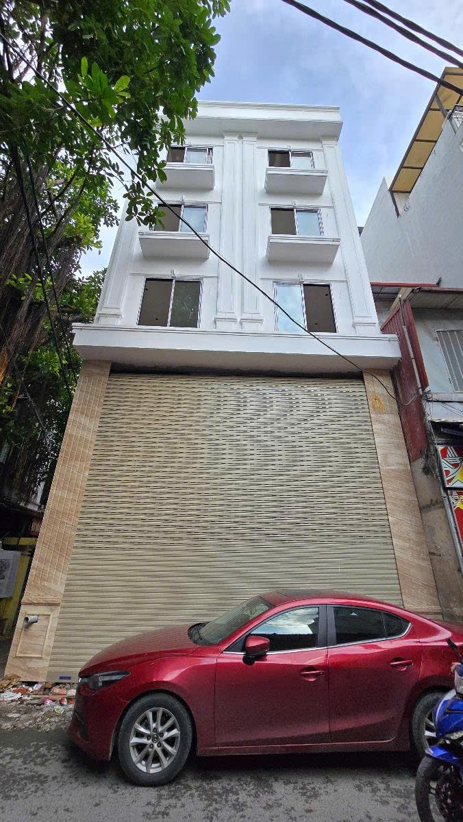 Bán tòa nhà tổ hợp, lô góc MP Định Công Thượng 7 tầng thang máy, dòng tiền đỉnh giá 90 tỷ. - Ảnh chính