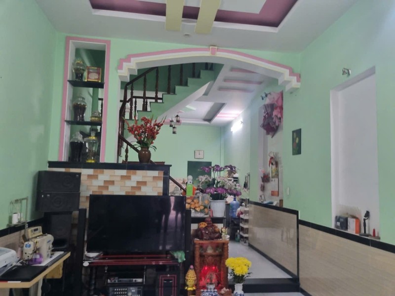 Bán nhà 2 Tầng DĩAn,SHR đường 2 xe hơi thông,gần chợ Tân Long - Ảnh chính