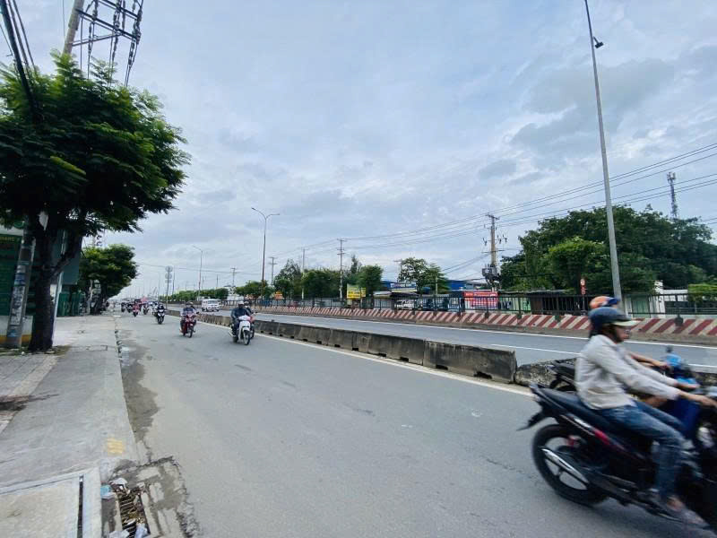 Bán nhà Mặt tiền Quốc Lộ 1A - gần Tân Kỳ Tân Quý, 14x34m, Cấp 4, cho thuê 45 tr, 25 tỷ. - Ảnh chính