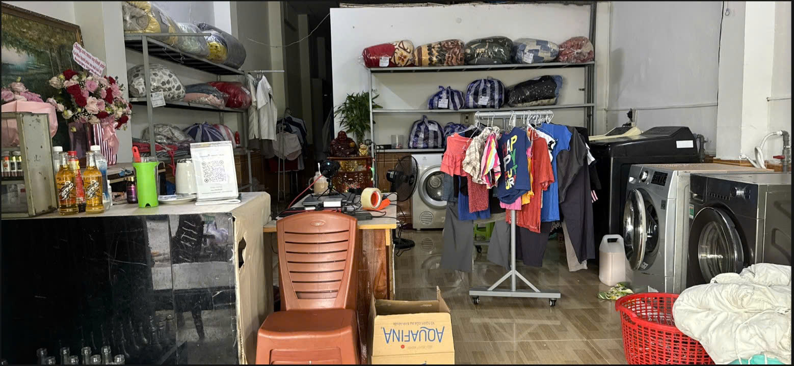 SANG NHƯỢNG TIỆM GIẶT ỦI HOẠT ĐỘNG GẦN 10 NĂM TẠI CHỢ HÒA KHÁNH, ĐÀ NẴNG - Ảnh 1